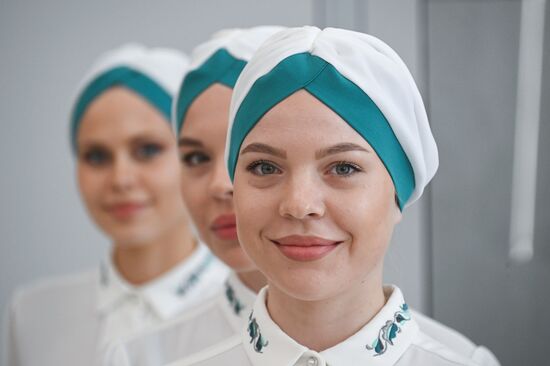 Volunteers at the 14th Russia - Islamic World: KazanForum International Economic Forum. Crediting the source is mandatory when using the photo. Location: Russia, Republic of Tatarstan, Kazan. Author: Kirill Kallinikov/ANO “Directorate for Sports and Social Projects”. KAZANFORUM 2023. Sidelines