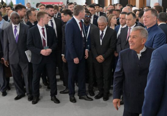 Right, foreground: Head of the Tatarstan Republic Rustam Minnikhanov at an official opening ceremony of the international exhibition RUSSIA HALAL EXPO 2023, part of the 14th International Economic Forum RUSSIA — ISLAMIC WORLD: KAZANFORUM. Crediting the source is mandatory when using the photo. Location: Russia, Republic of Tatarstan, Kazan. Author: Evgeny Biyatov/ANO “Directorate for Sports and Social Projects”. KAZANFORUM 2023. Official opening ceremony of international exhibition RUSSIA HALAL EXPO 2023
