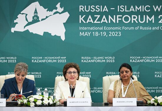 From left: CEO of ANO Platform Elina Sidorenko, Deputy Federation Council Speaker Galina Karelova, and President of the BRICS International Forum Purnima Anand (India) at the press conference, A Woman’s Perspective on Non-Woman’s Business, held as part of the XIV International Economic Forum RUSSIA — ISLAMIC WORLD: KAZANFORUM 2023. Crediting the source is mandatory when using the photo. Location: Russia, Republic of Tatarstan, Kazan. Author: Ramil Sitdikov/ANO “Directorate for Sports and Social Projects”. KAZANFORUM 2023. Press conference: A Woman’s Perspective on Non-Woman’s Business