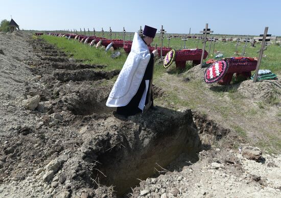 Russia Ukraine Military Operation Remains Reburial