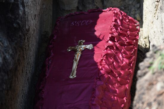 Russia Ukraine Military Operation Remains Reburial