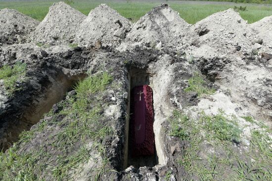 Russia Ukraine Military Operation Remains Reburial