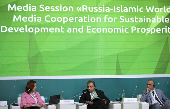 From left: Anna Belikova, Advisor to the Russia-Islamic World Strategic Vision Group, Senior Lecturer at Moscow State University, MGIMO and Russian Presidential Academy of National Economy and Public Administration, Chief Specialist of the External Communications Service at RT, Yunus Inayat, Director of International Relations and Strategic Development, Union of OIC News Agencies, and Najeh Missaoui, President and CEO of Tunis Afrique Presse, at the session on Russia and the Islamic World: Media Cooperation for Sustainable Development and Economic Prosperity as part of the XIV International Economic Forum RUSSIA — ISLAMIC WORLD: KAZANFORUM 2023. Crediting the source is mandatory when using the photo. Location: Russia, Republic of Tatarstan, Kazan. Author: Alexandr Kryazhev/ANO “Directorate for Sports and Social Projects”. KAZANFORUM 2023. Russia and the Islamic World: Media Cooperation for Sustainable Development and Economic Prosperity