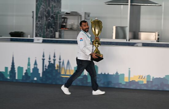 A participant of the International Cup of Chefs KazanForum 2023 as part of the 14th Russia - Islamic World: KazanForum International Economic Forum. Chefs' national teams from 11 countries will compete in the art of cuistine. Crediting the source is mandatory when using the photo. Location: Russia, Republic of Tatarstan, Kazan. Author: Svetlana Shevchenko/ANO “Directorate for Sports and Social Projects”. KAZANFORUM 2023. Dialogue of Cultures: Opening of the International Cup of Chefs KazanForum 2023
