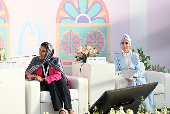 Left: Siham Al Harthi, board member of the Oman Chamber of Commerce and Industry, and Chair of the Council of the NUR Association of Women's Social Initiatives Aigul Khairullina at the session on Charity: The Boomerang of Good in Islam as part of the XIV International Economic Forum RUSSIA — ISLAMIC WORLD: KAZANFORUM 2023. Crediting the source is mandatory when using the photo. Location: Russia, Republic of Tatarstan, Kazan. Author: Maksim Bogodvid/ANO “Directorate for Sports and Social Projects”. KAZANFORUM 2023. Charity: The Boomerang of Good in Islam