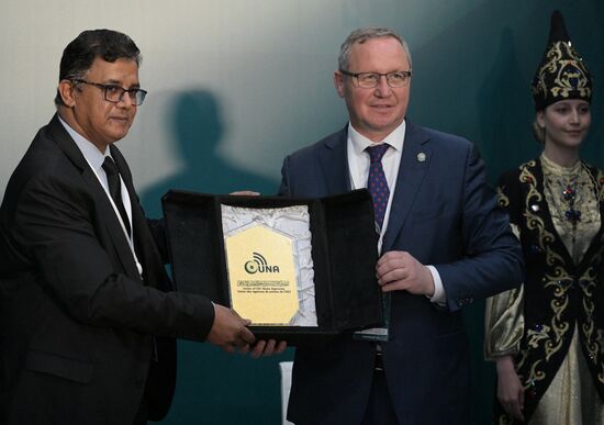 From left: Mohammed Al-Yami, Director General of the OIC Union of News Agencies, and Aidar Salimgarayev, Head of Tatmedia, the Republican Agency for Press and Mass Communications, at the signing ceremony of an agreement on the development and strengthening of bilateral professional cooperation in the information field after the session on Russia and the Islamic World: Media Cooperation for Sustainable Development and Economic Prosperity as part of the XIV International Economic Forum RUSSIA — ISLAMIC WORLD: KAZANFORUM 2023. Crediting the source is mandatory when using the photo. Location: Russia, Republic of Tatarstan, Kazan. Author: Alexandr Kryazhev/ANO “Directorate for Sports and Social Projects”. KAZANFORUM 2023. Russia and the Islamic World: Media Cooperation for Sustainable Development and Economic Prosperity