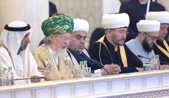 Second left: Sheikhul-Islam Talgat Tadzhuddin, Chief Mutfi and Chair of the Central Spiritual Directorate of Russian Muslims. Russia-Islamic World Strategic Vision Group, a session during the 14th Russia - Islamic World: KazanForum international economic forum. Photos may be used subject to the terms in the forum-specific section of the media bank. Location: Russia, Republic of Tatarstan, Kazan. Author: Pavel Lisitsyn/ANO “Directorate for Sports and Social Projects”. KAZANFORUM 2023. Russia-Islamic World Strategic Vision Group