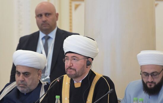 Center: Sheikh Ravil Gainutdin, Chairperson of the Spiritual Directorate of Russian Muslims, Chairperson of the Council of Russian Muftis. Russia-Islamic World Strategic Vision Group, a session during the 14th Russia - Islamic World: KazanForum international economic forum. Photos may be used subject to the terms in the forum-specific section of the media bank. Location: Russia, Republic of Tatarstan, Kazan. Author: Pavel Lisitsyn/ANO “Directorate for Sports and Social Projects”. KAZANFORUM 2023. Russia-Islamic World Strategic Vision Group