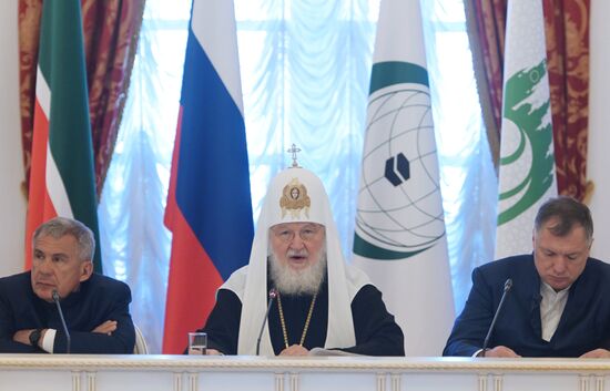From left: President of the Republic of Tatarstan Rustam Minnikhanov and Patriarch Kirill of Moscow and All Russia. Russia-Islamic World Strategic Vision Group, a session during the 14th Russia - Islamic World: KazanForum international economic forum. Photos may be used subject to the terms in the forum-specific section of the media bank. Location: Russia, Republic of Tatarstan, Kazan. Author: Pavel Lisitsyn/ANO “Directorate for Sports and Social Projects”. KAZANFORUM 2023. Russia-Islamic World Strategic Vision Group