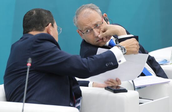 Participants in the Russia-Egypt session held as part of the 14th Russia - Islamic World: KazanForum International Economic Forum. Right: Egypt's Ambassador to Russia Nazih Ali Elnaggary. Photos may be used subject to the terms in the forum-specific section of the media bank. Location: Russia, Republic of Tatarstan, Kazan. Author: Pavel Lisitsyn/ANO “Directorate for Sports and Social Projects”. KAZANFORUM 2023. Russia-Egypt