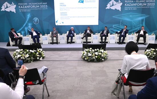 Participants in the Development of the Market for Digital Financial Assets session held as part of the 14th Russia - Islamic World: KazanForum International Economic Forum. Photos may be used subject to the terms in the forum-specific section of the media bank. Location: Russia, Republic of Tatarstan, Kazan. Author: Kirill Kallinikov/ANO “Directorate for Sports and Social Projects”. KAZANFORUM 2023. Development of the Market for Digital Financial Assets