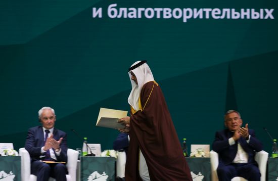 From left: First Deputy Prime Minister of Russia Andrei Belousov, Minister of Justice, Islamic Affairs and Waqf Nawaf bin Mohamed Al-Mawadeh, and Head of the Tatarstan Republic Rustam Minnikhanov at the plenary session of the Russia – Islamic World 14th International Economic Forum: Economy of Trust: Partnership between the Russian Federation and the OIC Countries. Photos may be used subject to the terms in the forum-specific section of the media bank. Location: Russia, Republic of Tatarstan, Kazan. Author: Evgeny Biyatov/ANO “Directorate for Sports and Social Projects”. KAZANFORUM 2023. Plenary session of the Russia – Islamic World 14th International Economic Forum