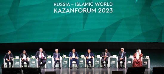 From left: Amr Abdel Hamid, General Director of TEN TV Channel, Malaysia's Minister of Agriculture and Food Security Datuk Seri Haji Mohamad bin Sabu, Deputy Prime Minister of Russia Alexei Overchuk, First Deputy Prime Minister of Russia Andrei Belousov, Deputy Prime Minister of Russia Marat Khusnullin, Head of the Tatarstan Republic Rustam Minnikhanov, Assistant Secretary General of the OIC for Economic Cooperation Ahmad Kawesa Sengendo, Deputy Prime Minister of Azerbaijan Shahin Mustafayev, and Minister of Justice, Islamic Affairs and Waqf Nawaf bin Mohamed Al-Mawadeh at the plenary session of the Russia – Islamic World 14th International Economic Forum: Economy of Trust: Partnership between the Russian Federation and the OIC Countries. Photos may be used subject to the terms in the forum-specific section of the media bank. Location: Russia, Republic of Tatarstan, Kazan. Author: Maksim Bogodvid/ANO “Directorate for Sports and Social Projects”. KAZANFORUM 2023. Plenary session of the Russia – Islamic World 14th International Economic Forum