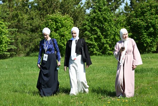 Girls wear traditional garments during the Izge Bolgar Zhyeny festival held as part of the 14th International Russia — Islamic World Economic Forum. Photos may be used subject to the terms in the forum-specific section of the media bank. Location: Russia, Republic of Tatarstan, Bolgar. Author: Maksim Bogodvid/ANO “Directorate for Sports and Social Projects”. KAZANFORUM 2023. Izge Bolgar Zhyeny Festival