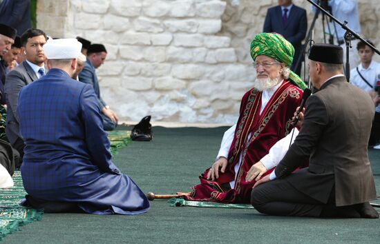 Supreme mufti of Russia and Chair of the Central Spiritual Board of Russia's Muslims Talgat Tajuddin, second right, during the Izge Bolgar Zhyeny festival held as part of the 14th International Russia — Islamic World Economic Forum. Photos may be used subject to the terms in the forum-specific section of the media bank. Location: Russia, Republic of Tatarstan, Bolgar. Author: Alexei Danichev/ANO “Directorate for Sports and Social Projects”. KAZANFORUM 2023. Izge Bolgar Zhyeny Festival
