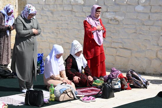 Female believers make a collective prayer during the Izge Bolgar Zhyeny festival held as part of the 14th International Russia — Islamic World Economic Forum. Photos may be used subject to the terms in the forum-specific section of the media bank. Location: Russia, Republic of Tatarstan, Bolgar. Author: Maksim Bogodvid/ANO “Directorate for Sports and Social Projects”. KAZANFORUM 2023. Izge Bolgar Zhyeny Festival