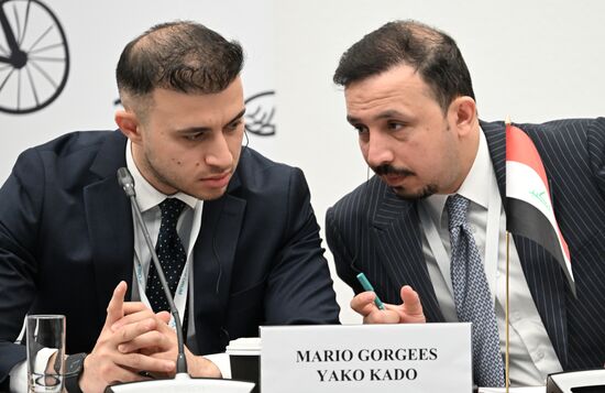 Left: Mario Kado at the OIC Young Diplomats Forum held as part of the 14th International Economic Forum Russia - Islamic World: KAZANFORUM. Photos can be used on terms listed in the media-bank's Forum section. Location: Russia, Republic of Tatarstan, Kazan. Author: Alexey Maishev/ANO “Directorate for Sports and Social Projects”. KAZANFORUM 2023. OIC Young Diplomats Forum