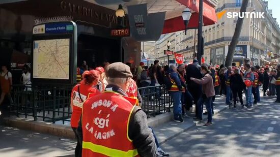 Activists block entrance to the Galeries Lafayette store in Paris