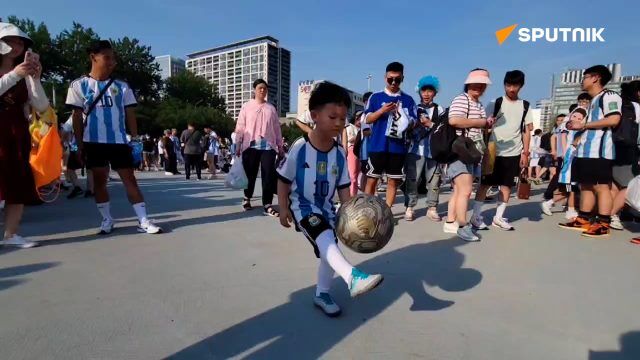 Messi's fans gather at a Beijing stadium to watch Argentina-Australia match