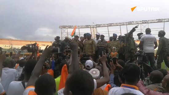 A large crowd greets Niger’s military leaders at a pro-coup rally