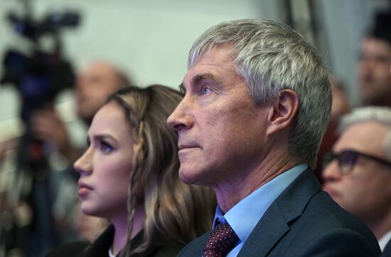 The 100 Days Before the Games of the Future celebration ceremony and the Games of the Future: Trophy's Journey motor rally kickoff. Sergei Krikalyov, Executive Director for Manned Space Programs, Roscosmos State Corporation; Alina Zagitova, Olympic figure skating champion. Location: Russia, Moscow. Author: Vladimir Astapkovich/Sputnik. RUSSIA EXPO. 100 Days Before Games of Future ceremony and Games of Future: Trophy's Journey motor rally kickoff