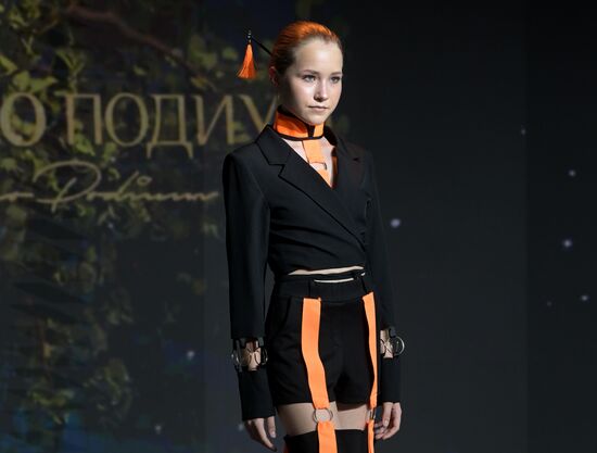 International RUSSIA EXPO forum and exhibition. Ethnic Runway fashion show and Russian Space performance
