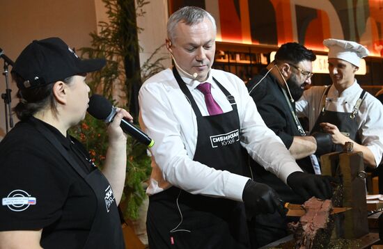 The International RUSSIA EXPO forum and exhibition. In Siberia, You Eat, a festival of Siberian cuisine at Pavilion K. Center: Andrei Travnikov, Governor of the Novosibirsk Region. Location: Russia, Moscow. Author: Kirill Kallinikov/Sputnik. RUSSIA EXPO. In Siberia, You Eat, a festival of Siberian cuisine