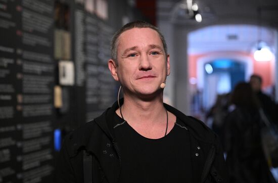 The International RUSSIA EXPO forum and exhibition. Media scrum at Pavilion 58 (The Slovo Museum of Slavic Literature). Pictured: Poet Anton Shagin, a theater and cinema actor, winner of the prizes of the Russian Government and President. Location: Russia, Moscow. Author: Ramil Sitdikov/Sputnik. RUSSIA EXPO. Concert: The Real Ones