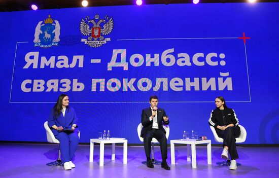 The RUSSIA EXPO International Forum and Exhibition. Meeting with participants in the My Russia tours from the Volnovakha District. Dmitry Artyukhov, Governor of the Yamalo-Nenets Autonomous Area, and Ksenia Razuvayeva, Director of the Federal Agency for Youth Affairs. Location: Russia, Moscow. Author: Ekaterina Chesnokova/Sputnik. RUSSIA EXPO. Yamal-Nenets Autonomous Area Day