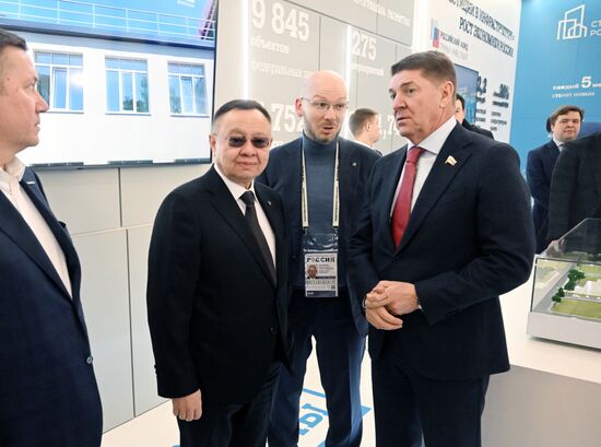 The International RUSSIA EXPO forum and exhibition. The ceremony to open Building the Future, an exhibition by the Russian Ministry of Construction, Housing and Utilities, at Pavilion 15. Center left: Irek Faizullin, Minister of Construction, Housing and Utilities. Location: Russia, Moscow. Author: Ilya Pitalev/Sputnik. RUSSIA EXPO. Ceremony to open exhibition by Russian Ministry of Construction