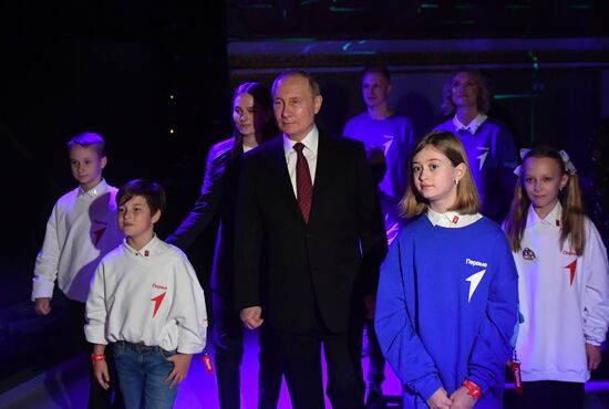 Russian President Vladimir Putin meets with representatives of the Dvizheniye Pervykh (Movement of the First) youth movement during his visit to the Russia Expo international exhibition and forum at the Exhibition of Achievements of National Economy (VDNKh) in Moscow, Russia. Location: Russia, Moscow. Author: Mikhail Voskresenskiy/Sputnik. President Vladimir Putin visits RUSSIA EXPO