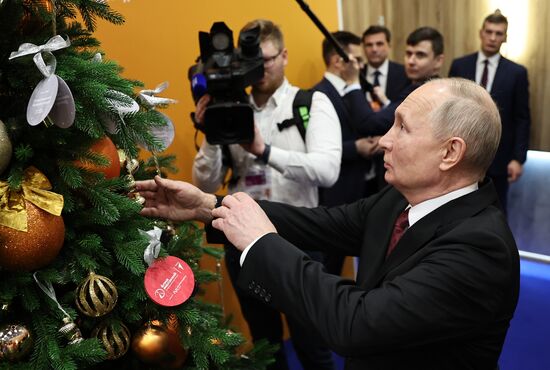 President Vladimir Putin takes part in Christmas Tree of Wishes charity campaign