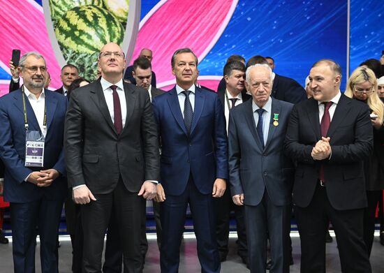 The International RUSSIA EXPO Forum and Exhibition. Republic of Adygeya Day. Pavilion 75. Deputy Prime Minister Dmitry Chernyshenko, second left, First Deputy Speaker of the Federation Council Andrei Yatskin, third left, and Head of Adygeya Murat Kumpilov, right. Location: Russia, Moscow. Author: Kirill Zykov/Sputnik. RUSSIA EXPO. Republic of Adygeya Day