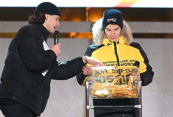 The International RUSSIA EXPO exhibition and forum. The Lada Granta Dream Car Lottery from Rosneft Co. and the Lada Sport Rosneft racing team on the Main Street Stage. Valentin "Val" Soroka, Presenter, Brigada U Morning Show, and Pilot Maxim Turiyev of the Lada Sport Rosneft Racing Team. Location: Russia, Moscow. Author: Maksim Blinov/Sputnik. RUSSIA EXPO. Lada Granta Dream Car Lottery from Rosneft Co. and Lada Sport Rosneft Racing Team