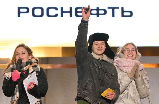 The International RUSSIA EXPO exhibition and forum. The Lada Granta Dream Car Lottery from Rosneft Co. and the Lada Sport Rosneft Racing Team on the Main Street Stage. Left:Tatiana "Vickie" Pestryakova, Presenter, Brigada U Morning Show. Center: Lada Granta Dream Car Lottery winner Ilya Frolikov and his girlfriend Darya. Location: Russia, Moscow. Author: Maksim Blinov/Sputnik. RUSSIA EXPO. Lada Granta Dream Car Lottery from Rosneft Co. and Lada Sport Rosneft Racing Team