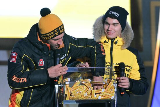The International RUSSIA EXPO exhibition and forum. The Lada Granta Dream Car Lottery from Rosneft Co. and the Lada Sport Rosneft racing team on the Main Street Stage. Pilots Leonid Panfilov and Maxim Turiyev of the Lada Sport Rosneft racing team. Location: Russia, Moscow. Author: Maksim Blinov/Sputnik. RUSSIA EXPO. Lada Granta Dream Car Lottery from Rosneft Co. and Lada Sport Rosneft Racing Team