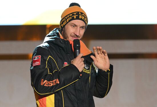 The International RUSSIA EXPO exhibition and forum. The Lada Granta Dream Car Lottery from Rosneft Co. and the Lada Sport Rosneft racing team on the Main Street Stage. Pilot Leonid Panfilov of the Lada Sport Rosneft racing team. Location: Russia, Moscow. Author: Maksim Blinov/Sputnik. RUSSIA EXPO. Lada Granta Dream Car Lottery from Rosneft Co. and Lada Sport Rosneft Racing Team