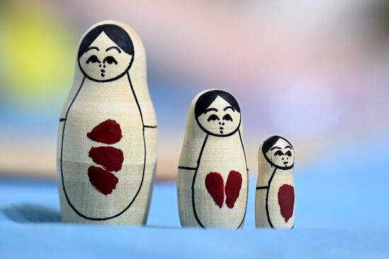RUSSIA EXPO. Russia's Christmas Trees project. Day of Semyonov matryoshka dolls