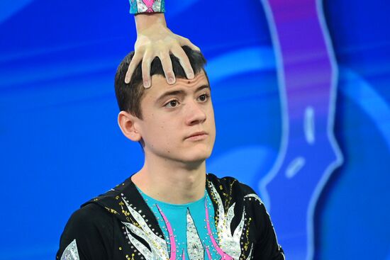 International RUSSIA EXPO forum and exhibition. Russian national acrobatics team's show. Champions of Russia, winners of international competitions.
Kristian Aleksei, Artyom Aleksei, winners of international tournaments in 2023 Location: Russia, Moscow. Author: Ramil Sitdikov/Sputnik. RUSSIA EXPO. Russian national acrobatics team