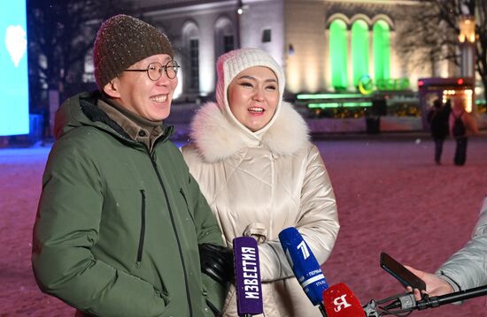 The International RUSSIA EXPO Forum and Exhibition. Families participating in lighting up the Heart of Russia family hearth during the launch of the Year of Family, speak to the media. Main outdoor stage. Vladislav Fyodorov and Zhanna Ksenofontova from the Republic of Sakha (Yakutia). Location: Russia, Moscow. Author: Maksim Blinov/Sputnik. RUSSIA EXPO. Year of Family launch ceremony during Loved Ones Forum