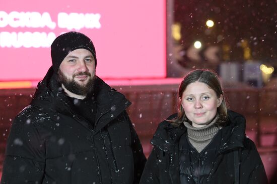 The International RUSSIA EXPO Forum and Exhibition. Families participating in lighting up the Heart of Russia family hearth during the launch of the Year of Family, speak to the media. Main outdoor stage. Konstantin Khetagurov and Anzhelika Kardanova from North Ossetia-Alania. Location: Russia, Moscow. Author: Maksim Blinov/Sputnik. RUSSIA EXPO. Year of Family launch ceremony during Loved Ones Forum