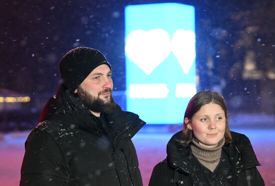 The International RUSSIA EXPO Forum and Exhibition. Families participating in lighting up the Heart of Russia family hearth during the launch of the Year of Family, speak to the media. Main outdoor stage. Konstantin Khetagurov and Anzhelika Kardanova from North Ossetia-Alania. Location: Russia, Moscow. Author: Maksim Blinov/Sputnik. RUSSIA EXPO. Year of Family launch ceremony during Loved Ones Forum