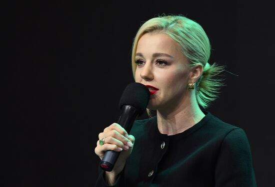 RUSSIA EXPO Tourism Day. Singer Yulianna Karaulova's performance