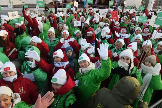RUSSIA EXPO. Procession by tour guides of Rosmolodyozh's More Than Travel program and exhibition volunteers