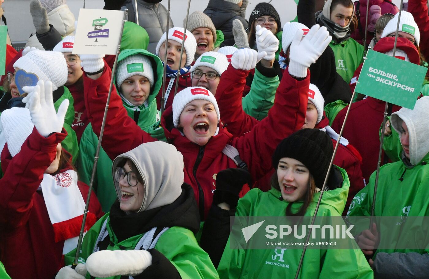 RUSSIA EXPO. Procession by tour guides of Rosmolodyozh's More Than Travel program and exhibition volunteers