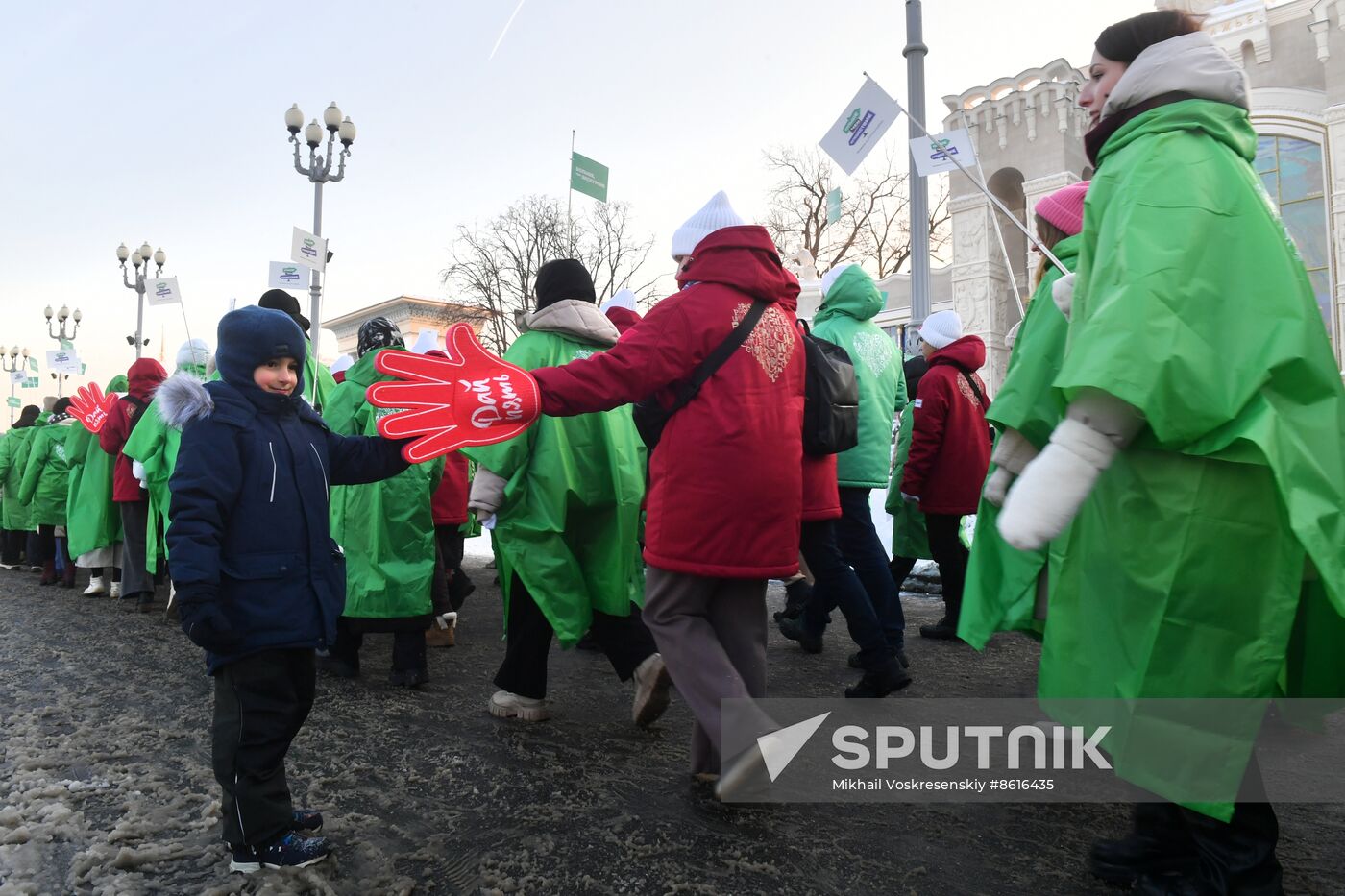 RUSSIA EXPO. Procession by tour guides of Rosmolodyozh's More Than Travel program and exhibition volunteers