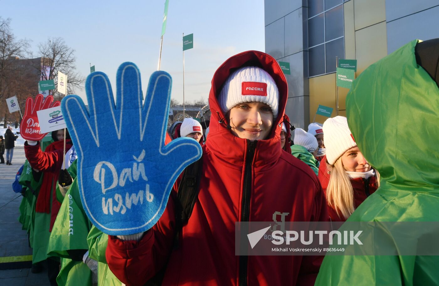 RUSSIA EXPO. Procession by tour guides of Rosmolodyozh's More Than Travel program and exhibition volunteers