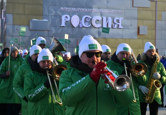 RUSSIA EXPO. Procession by tour guides of Rosmolodyozh's More Than Travel program and exhibition volunteers