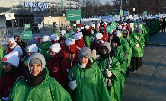 RUSSIA EXPO. Procession by tour guides of Rosmolodyozh's More Than Travel program and exhibition volunteers