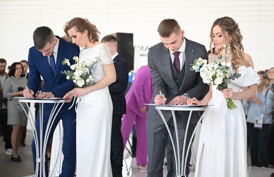 RUSSIA EXPO. Wedding ceremony for 16 couples working in nuclear industry from ten Russian cities from Moscow to Murmansk